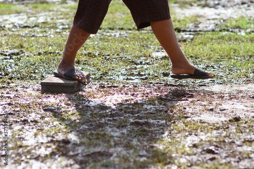 walking step over the dirt ground.