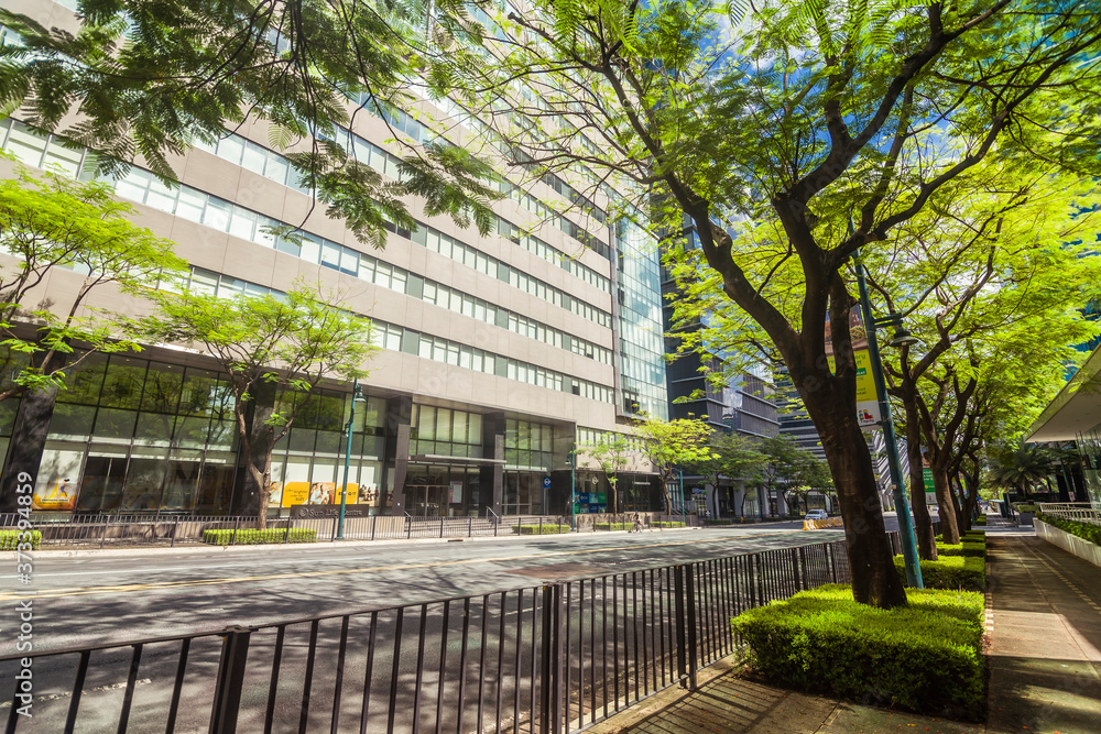 Fort Bonifacio, Taguig, Philippines: A tree lined sidewalk along 5th ...