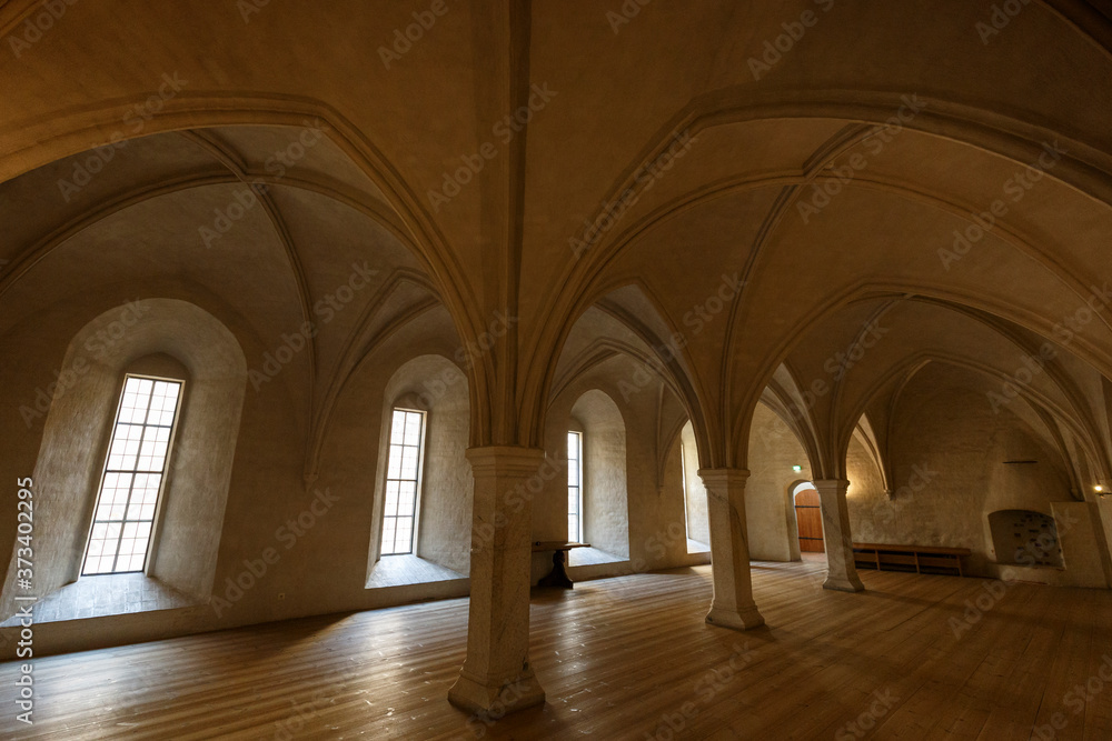 Large and empty hall inside the medieval and historical Turku Castle in Turku, Finland.