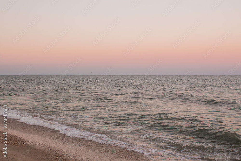 sandy sea beach in the evening