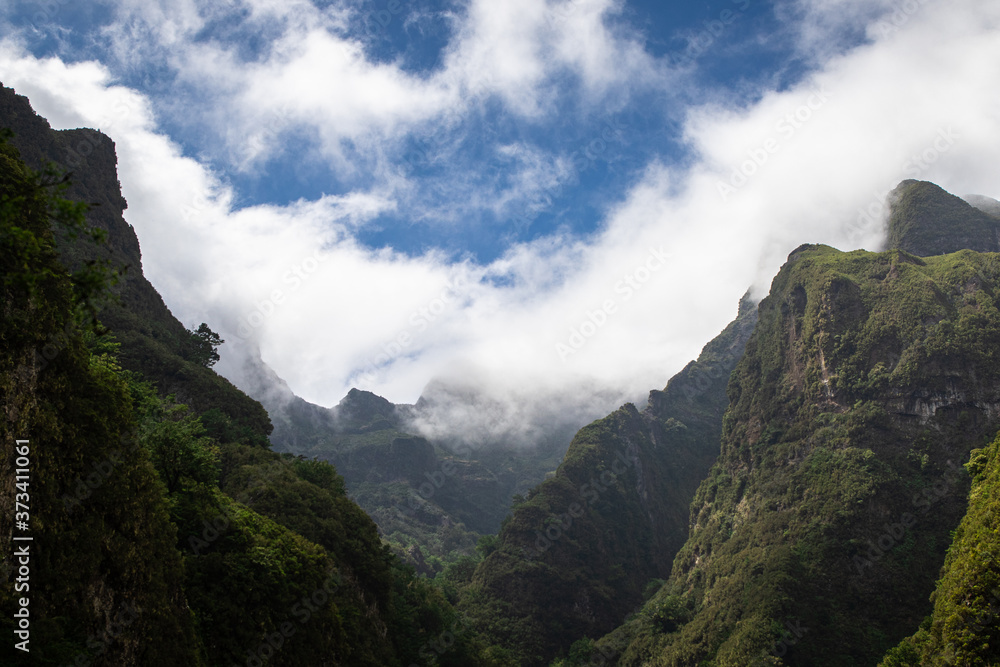 All green mountains covered by the clouds All green mountains covered by the clouds