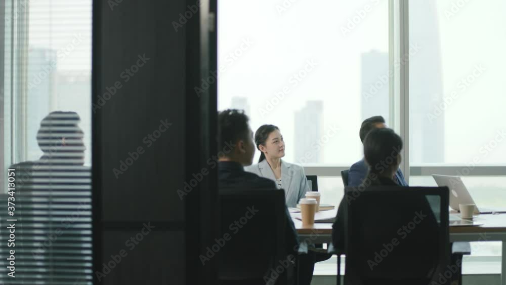 young asian business woman getting applause after delivering a presentation in team meeting in conference room young asian business woman getting applause after delivering a presentation in team meeting in conference room