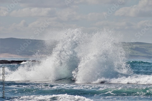 Breaking waves and white water around the coastline