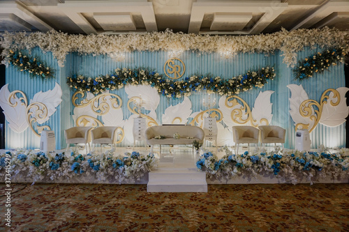 luxury wedding stage decoration background. white and blue theme concept. hanging flower