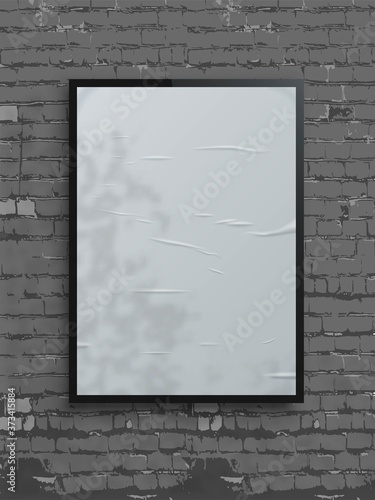 White bad glued placard on brick wall background