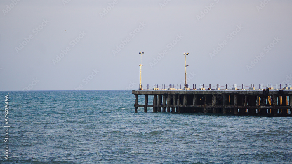 Indian style pier in the sea at Puducherry, India. 