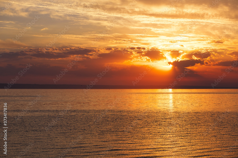 Obraz premium Colorful ocean beach sunrise. Dawn over the sea. Nature composition