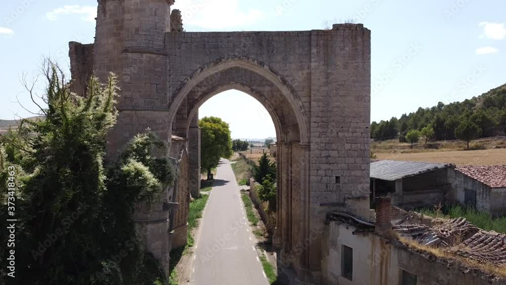 Aerial flying through archway of ruins of San Antón Monastery in Castrojeriz Aerial flying through archway of ruins of San Antón Monastery in Castrojeriz