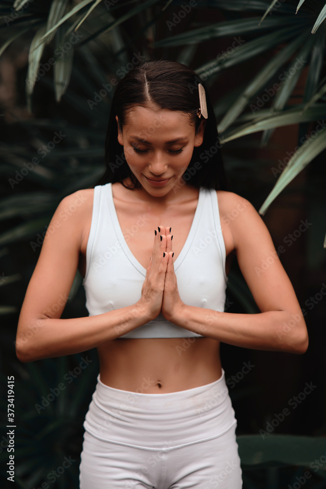 Asia Yoga instructor, in outdoor exercise. Portrait of gorgeous asian young woman practicing yoga outdoor