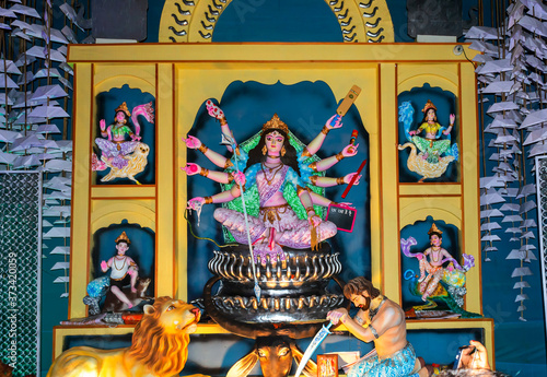 Durga Puja or Durgotsava,is an annual Hindu festival celebrated mainly in West Bengal,Indian.Durga is Goddess riding a lion with many arms each carrying weapon and defeating evil power of Mahishasura.