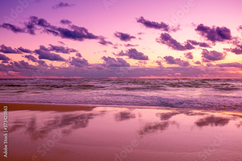 Seascape in the early morning. Purple sunrise over the sea © vvvita