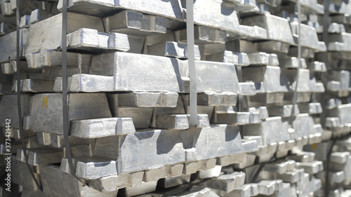Metal ingots in Aluminium foundry. Billets for aluminium profile production at a metallurgical plant