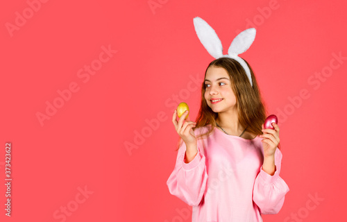 Easter bunny hold painted eggs. happy easter. smiling kid in rabbit ears. Egg hunt on spring holiday. Holiday celebration, preparation. Easter is coming. Which one do you want. copy space
