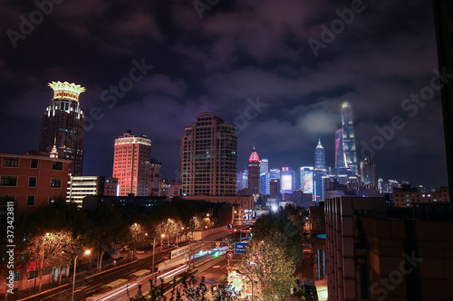 Modern city at night. Shanghai scenery at night. Shanghai cloud at night. Romantic nightscape and peaceful streetscape of a modern city.