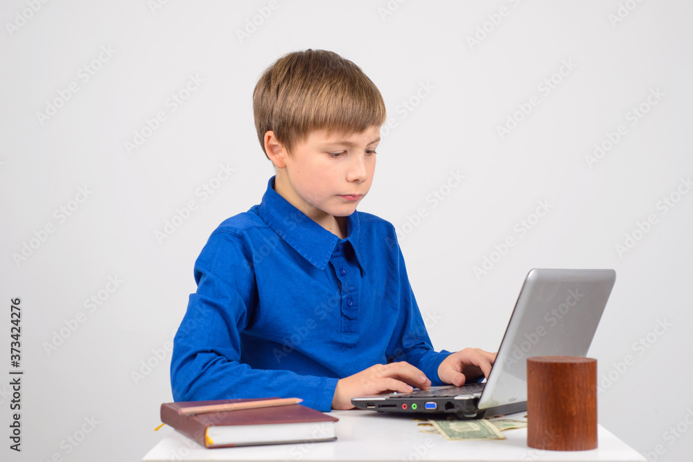 little businessman - Young, serious, smart boy looking intently little businessman - Young, serious, smart boy looking intently