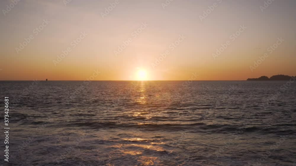 Sunset Sun on Pacific Ocean Horizon in Front of San Francisco Bay, Baker Beach Sunset Sun on Pacific Ocean Horizon in Front of San Francisco Bay, Baker Beach