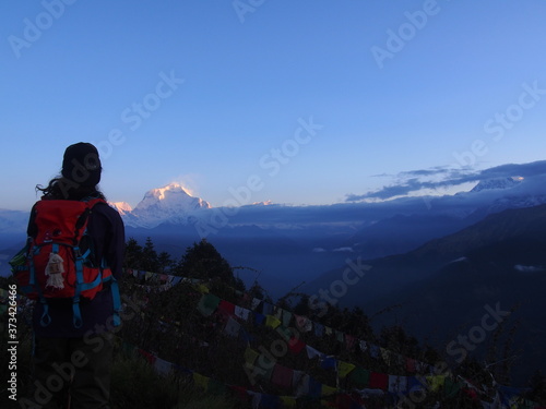 A man looking great nature, A hill station "Poon Hill" overlooking the Annapurna Massif range and Dhaulagiri mountain range, ABC (Annapurna Base Camp) Trek, Annapurna, Nepal