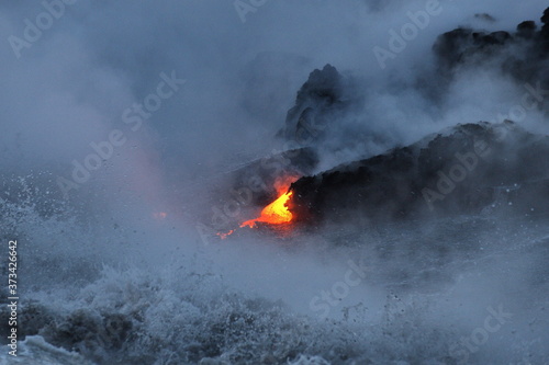 Lava flowing into the ocean from lava volcanic eruption on Big Island Hawaii, USA.