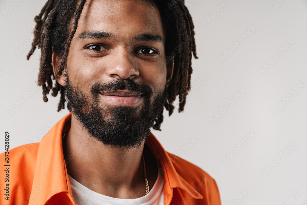 Fototapeta premium Guy posing isolated over grey wall background