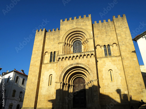 West façade of the Old Cathedral of Coimbra (Sé Velha de Coimbra) in Coimbra, PORTUGAL
