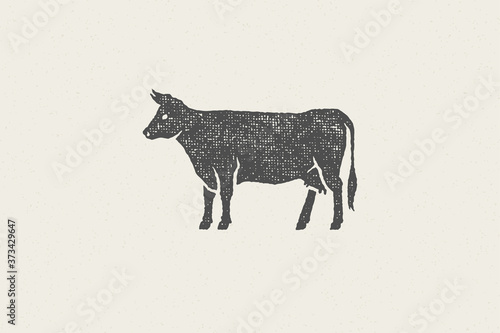 Black cow silhouette for meat industry or farmers market hand drawn stamp effect vector illustration.