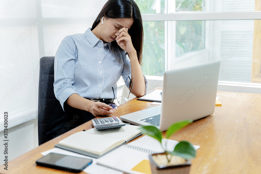 Woman tired and Stressed at workplace. Woman tired and Stressed at workplace.