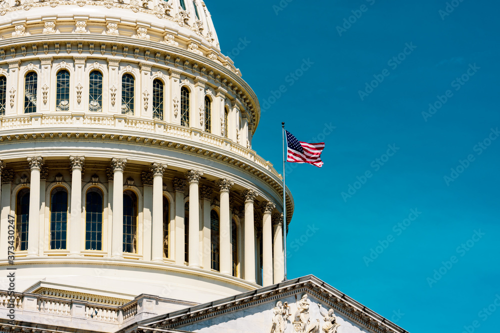 United States flags with Capitol building in Washington DC, retro color  style, Background with copy space, USA