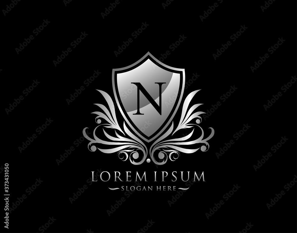 Fototapeta premium Luxury Shield N Letter Logo. Graceful Elegant Silver shield icon design.