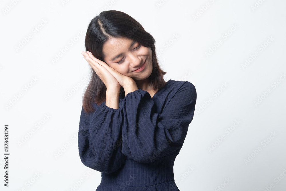 Beautiful young Asian woman with sleeping gesture. Beautiful young Asian woman with sleeping gesture.