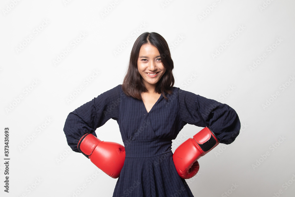 Young Asian woman with red boxing gloves. Young Asian woman with red boxing gloves.