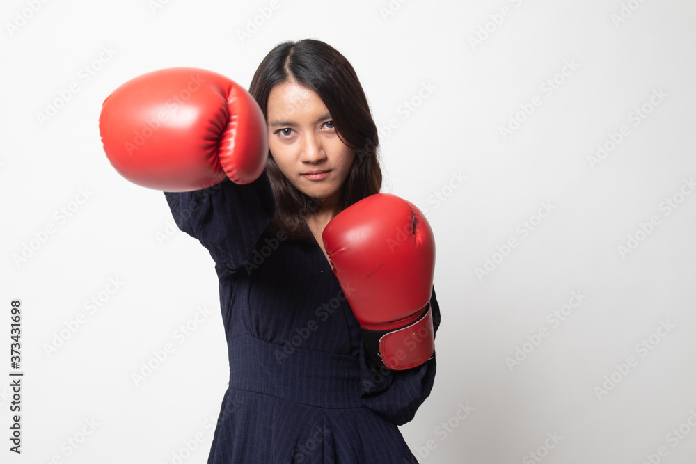 Young Asian woman with red boxing gloves. Young Asian woman with red boxing gloves.