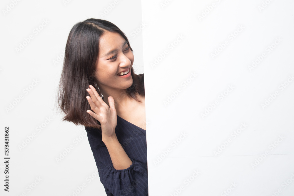 Excited young Asian woman with blank sign. Excited young Asian woman with blank sign.