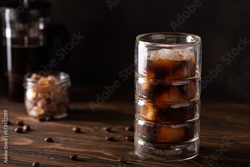 iced black coffee with ice in a glass