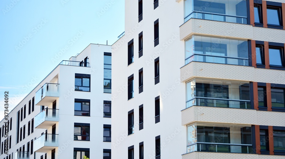 Architectural details of modern apartment building. Modern european residential apartment building complex.