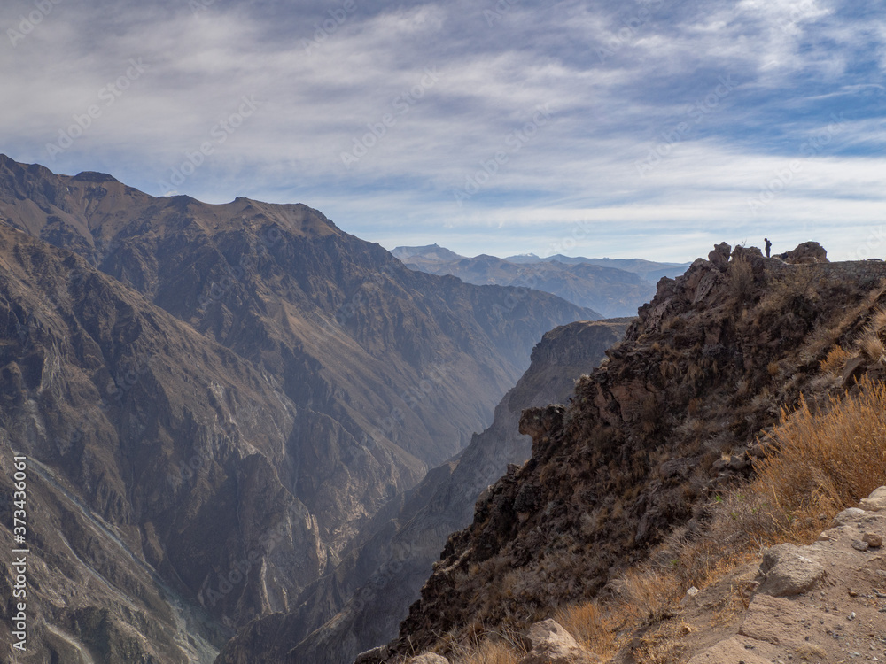 Dry brown mountain landscape with a blue sky in Cañon del Colca (Colca Valley) in Arequipa, Peru