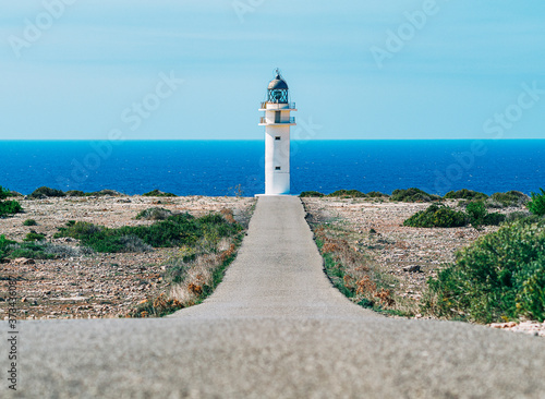 Faro en playa de Formentera photo