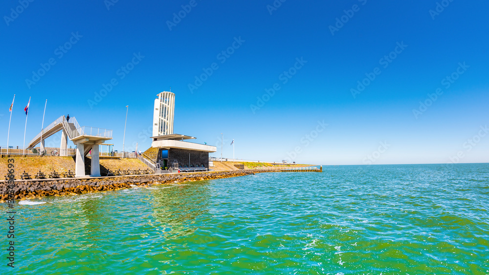 The IJsselmeer in the Netherlands with the observation tower on the Afsluitdijk The IJsselmeer in the Netherlands with the observation tower on the Afsluitdijk