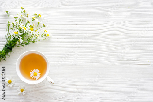 chamomile herbal tea in cup top view