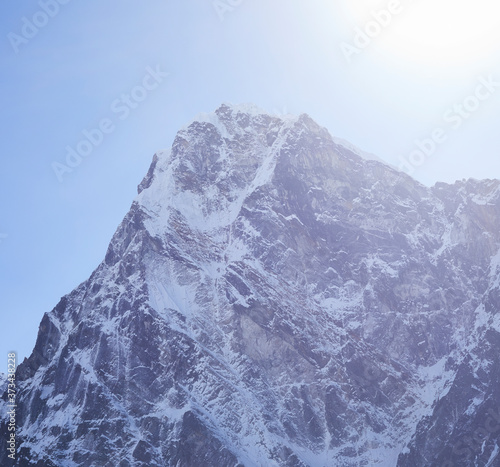 snow covered mountain in winter on the khumbu glacier