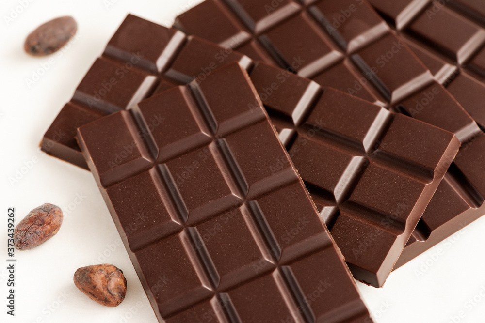 Bar of chocolate and cocoa beans. Bar of chocolate and cocoa beans.