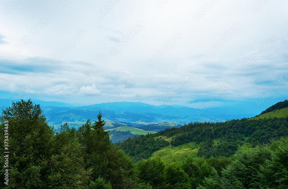 Beautiful mountain landscape with low clouds. Ukraine. Carpathians. Recreation.