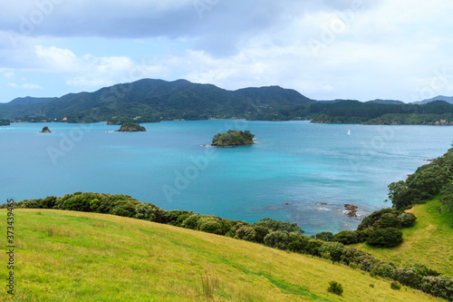 Bay of Islands, New Zealand. The view from the rolling hills of Urupukapuka Island, looking back towards the mainland