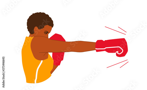 A strong young adult African American woman boxer throws a jab punch. A pretty box fighter girl boxing. A boxer attack side view. 