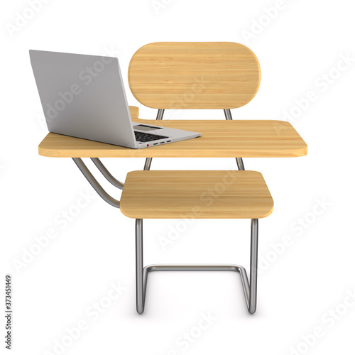 School desk and laptop on w...