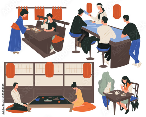 People dining in chinese restaurant, eating and drinking