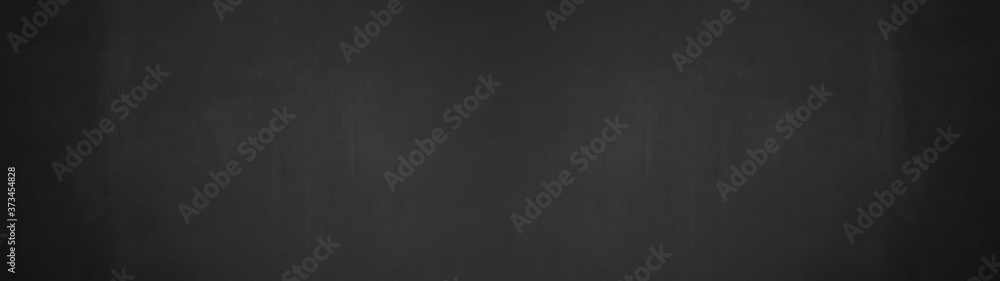 Black anthracite stone concrete chalkboard texture background wide panorama banner long	
