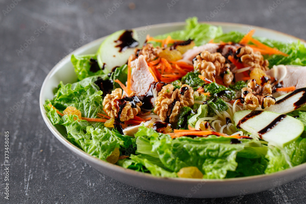 Salad with greens apple chicken and walnuts Salad with greens apple chicken and walnuts