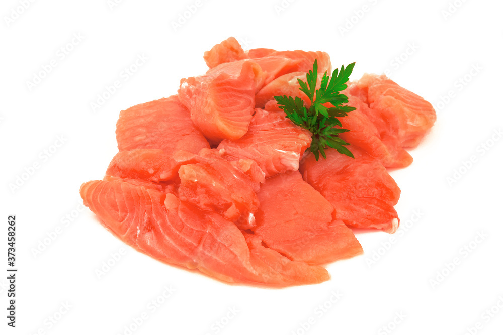 Pieces of red salmon fish with parsley herbs isolated on white b Pieces of red salmon fish with parsley herbs isolated on white b