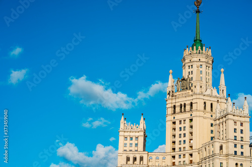 Moscow / Russia - 15 Aug 2020: Panorama of the famous high-rise building in Moscow against the blue sky in Kotelnicheskaya embankment, river walks and tourist season