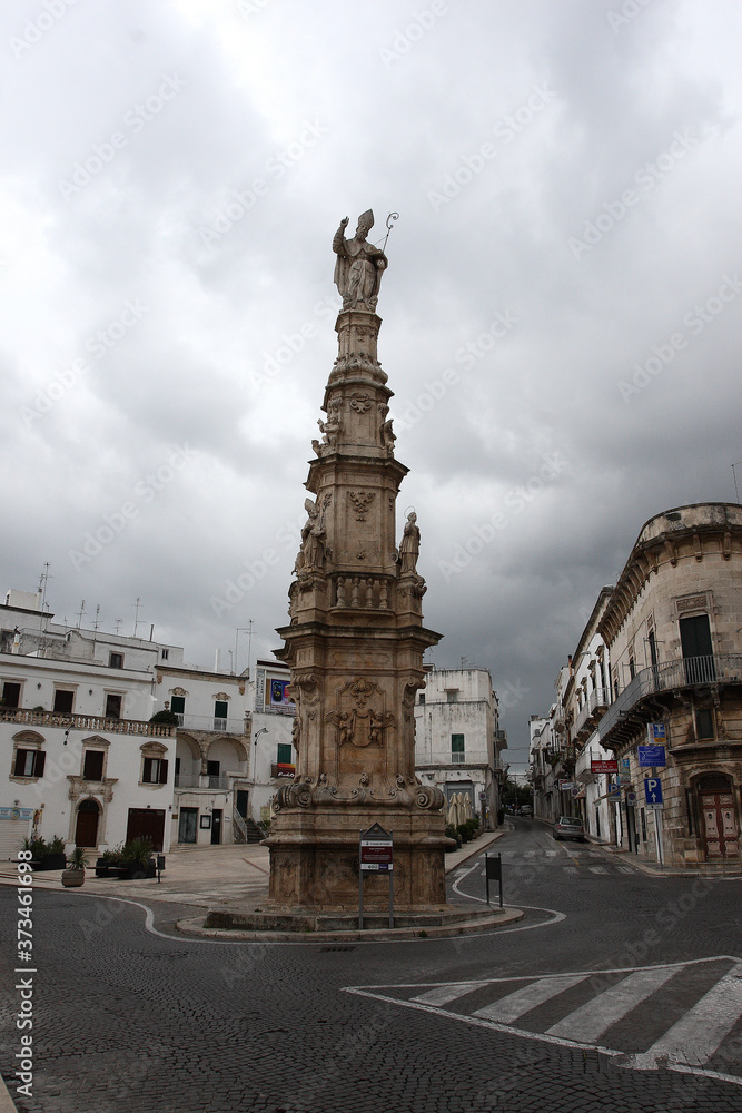 Ostuni, Italy - October 6, 2010: View of the square with the Column of Sant'Oronzo